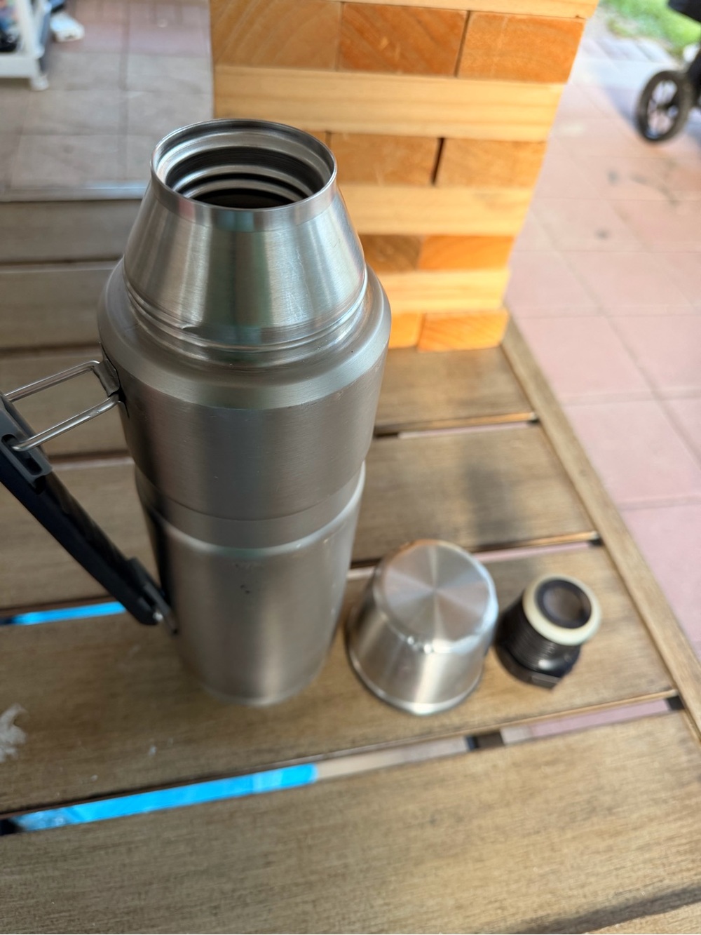 Thermos Stainless Steel Bottle in Silver with Black Handle